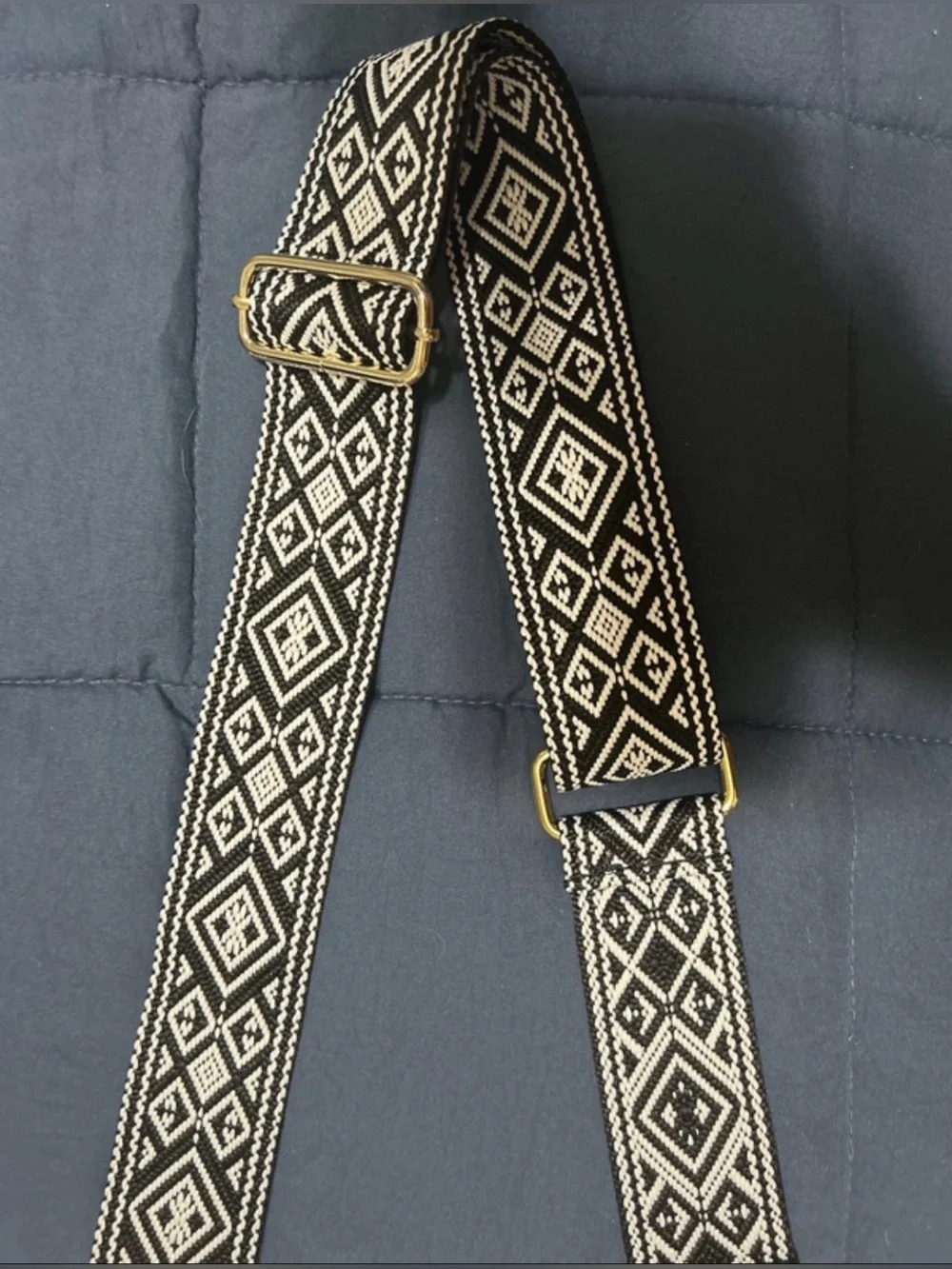 Black Leather Crossbody Bag with Patterned Strap